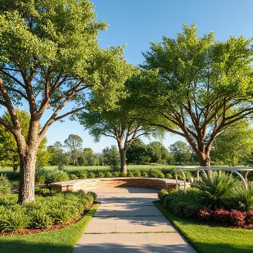 Beautiful landscape with well-maintained trees and integrated hardscape
